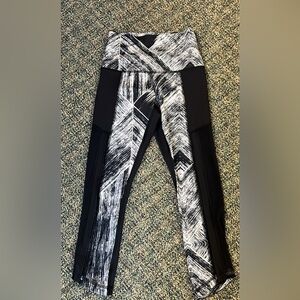 Lululemon black and white cropped leggings with mesh inserts
